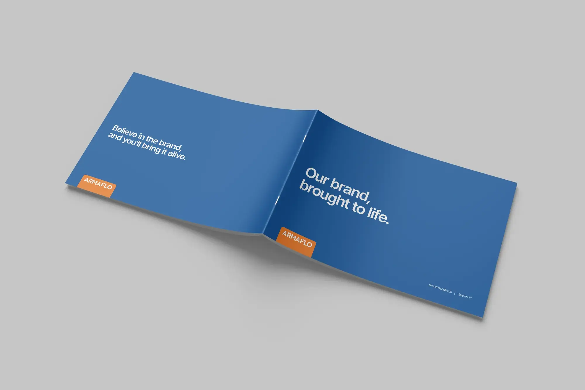 Armaflo brand book front and back covers in deep blue